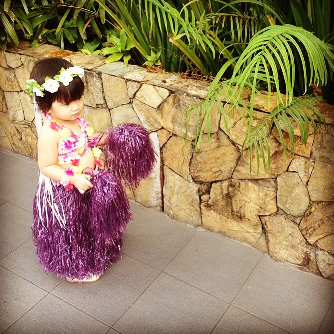 In her hawaiian outifit for a luau party